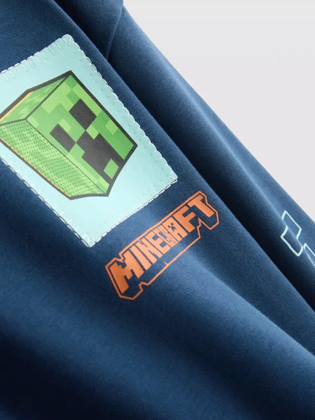 7–15 éves korosztály | Minecraft-motívumú, pamutban gazdag kapucnis pulóver