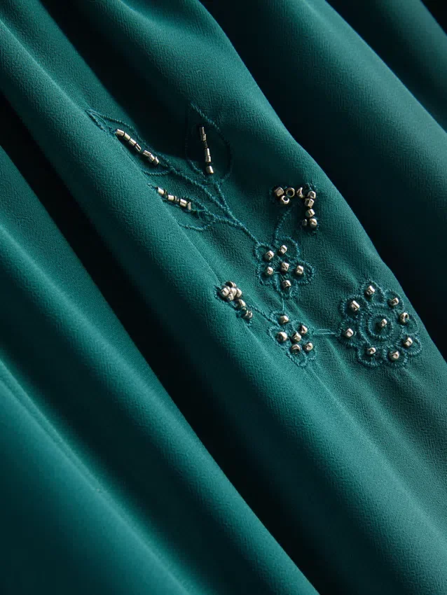 A Primark-kollekció | hálós, gyöngyös miniszoknya
