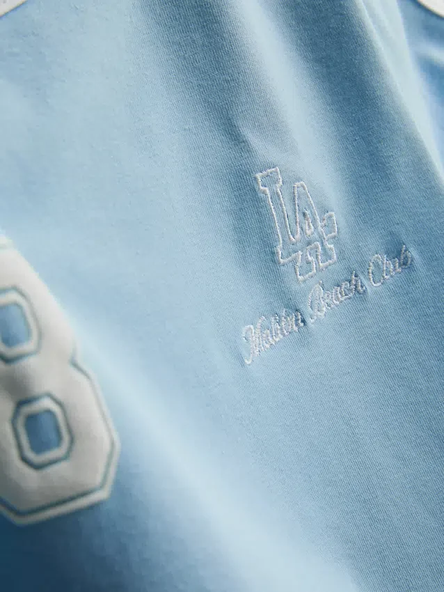 A Primark-kollekció | pamut grafikus babapóló