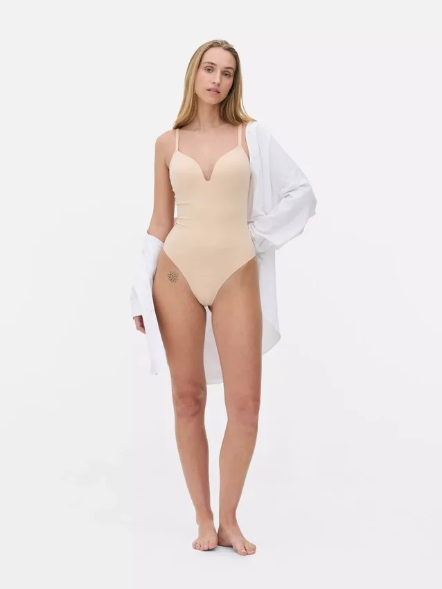Kupakos tangás body