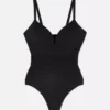 Kupakos tangás body