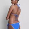 Öltéses részletekkel díszített, oldalán megkötős bikini alsó
