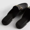 Műbőrből készült, szájkosár-motívumú papucs-loafer