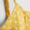 Melltartós, szív alakú nyakkivágású, pöttyös bikini felső