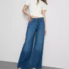 Pamut denim, közepes derékmagasságú, széles szárú farmer