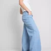 Pamut denim, közepes derékmagasságú, széles szárú farmer