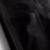 Pamut denim, közepes derékmagasságú, táguló szárú farmer