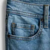 Pamut denim, közepes derékmagasságú, táguló szárú farmer