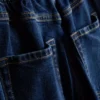 Pamut denim magas derekú, keskeny szárú farmer