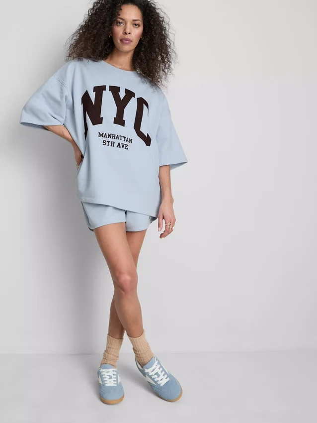 Pamutban gazdag, NYC-es, leeresztett ujjú pulóver