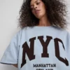 Pamutban gazdag, NYC-es, leeresztett ujjú pulóver