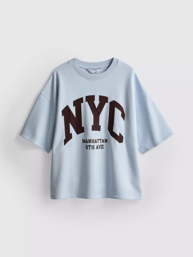 Pamutban gazdag, NYC-es, leeresztett ujjú pulóver