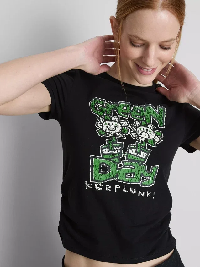 Pamutban gazdag, zöld, redős „Green Day” babapóló