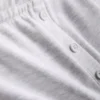 Pamutdomináns, gombos részletekkel ellátott jersey rövidnadrág