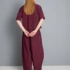 Papírszerű tapintású, redős, hordószárú nadrág
