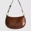 Paula Echevarría műbőr, szegecses válltáska