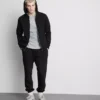 Rugalmas derékú, mandzsettás joggingnadrág