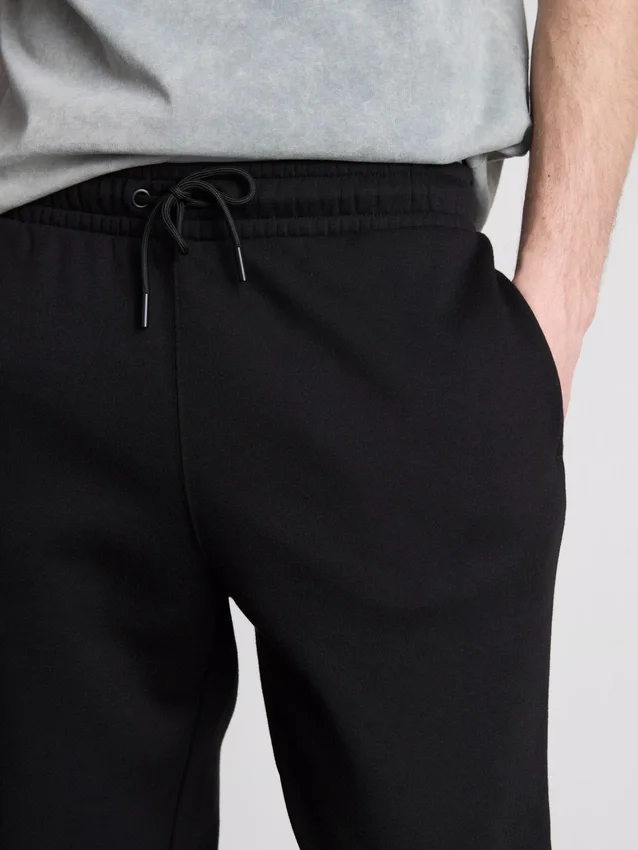 Rugalmas derékú, mandzsettás joggingnadrág