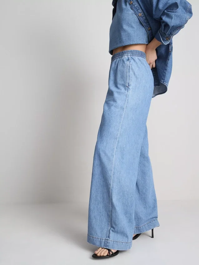 Széles szárú pamut denim edzőnadrág