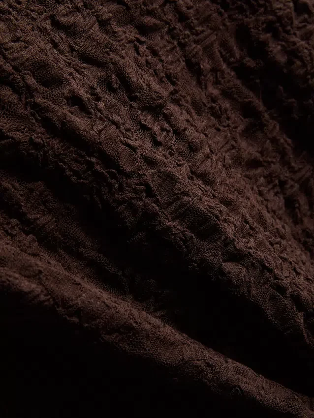 Texturált, magas nyakú felső