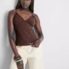 V-nyakú babydoll top