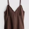 V-nyakú babydoll top