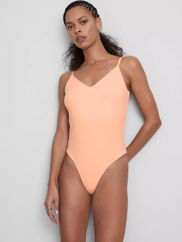 V-nyakú, pántos body